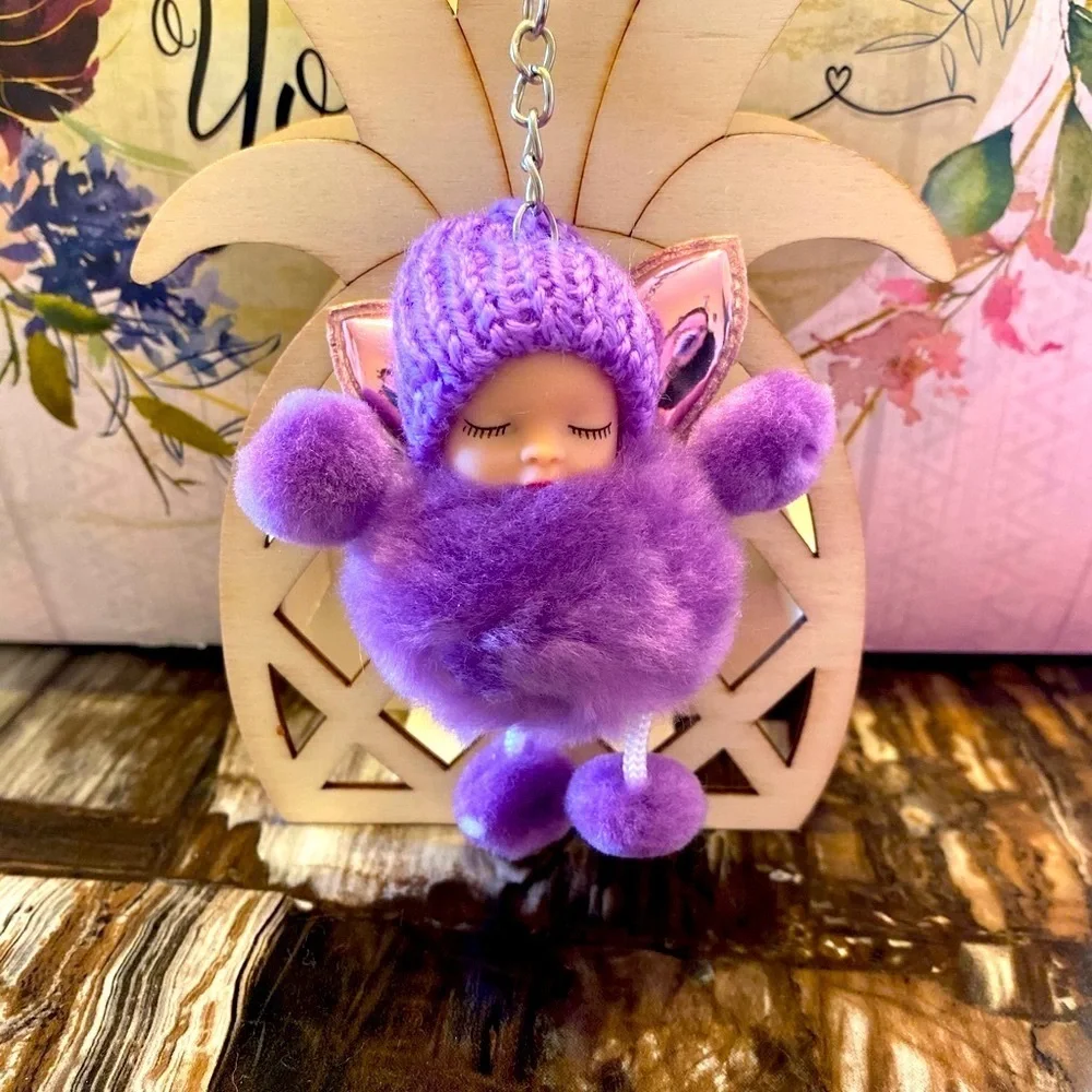 Sleepy baby with fairy wings‎ small pompon in purple keychain charm key holder